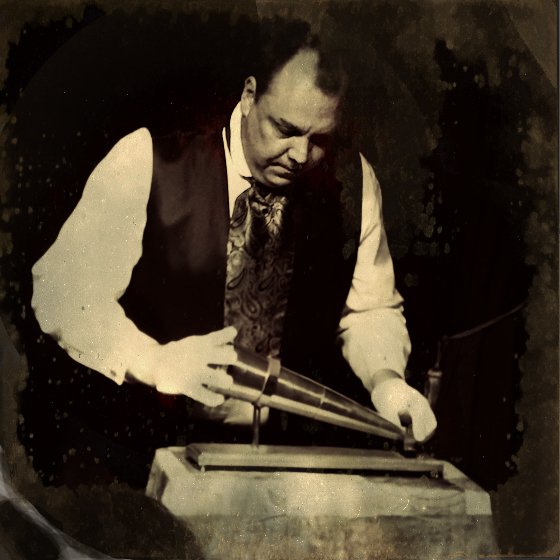 Dean Carnegie at a seance table